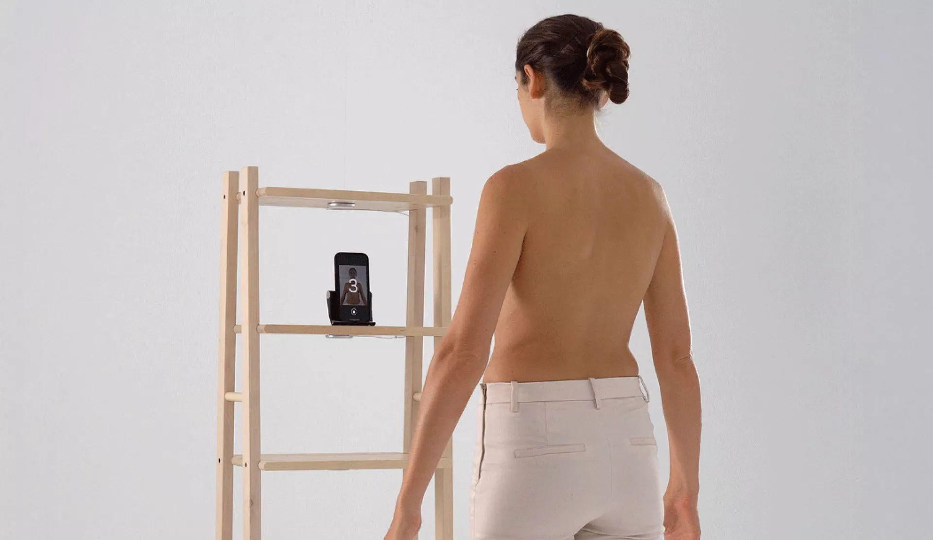 Woman taking photos for 3D imaging